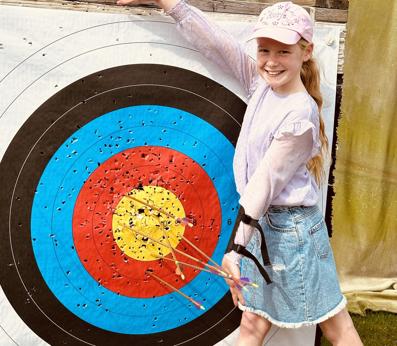 Girl standing by a target